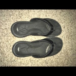 Well worn women's flip flops very used